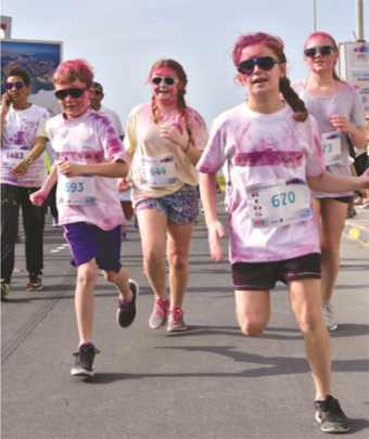 Gulf Weekly Colourful capers as run draws crowds